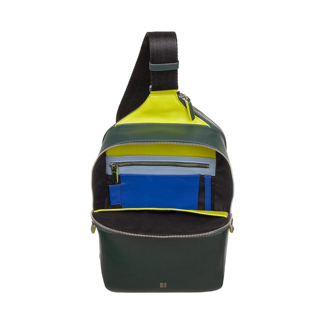 Two-tone sling bag with front pocket zippers open