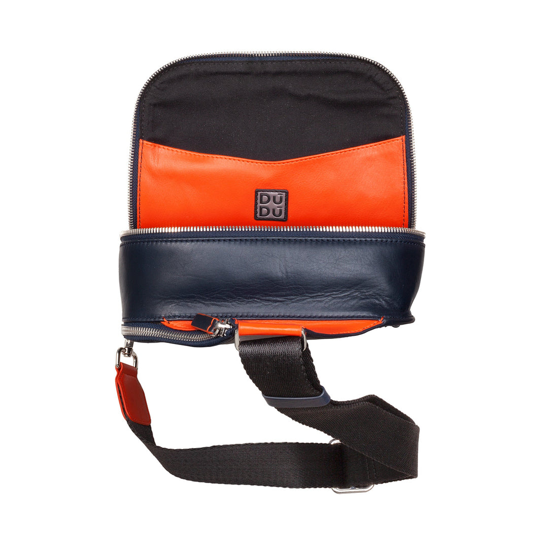 Colorful leather crossbody bag with black, orange, and navy blue sections and adjustable black strap