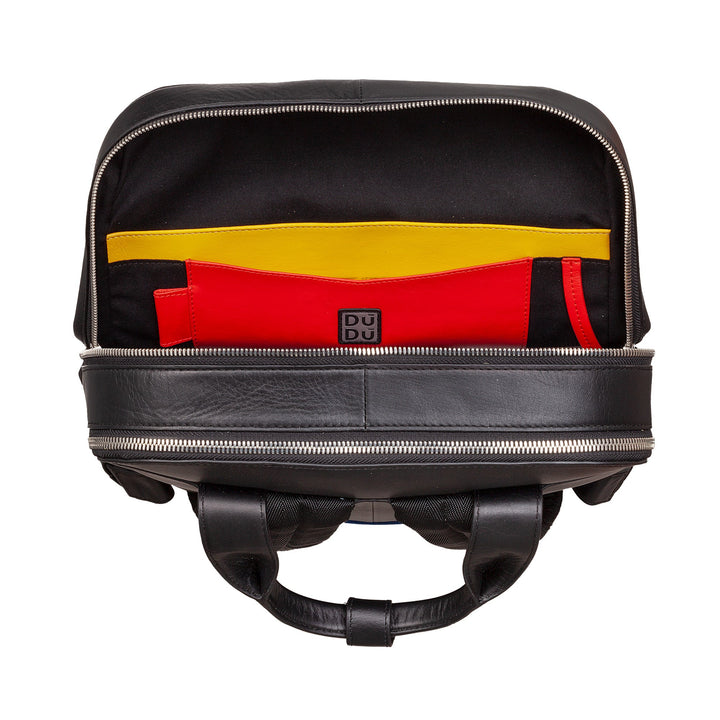 Open black leather backpack with colorful yellow and red interior pockets