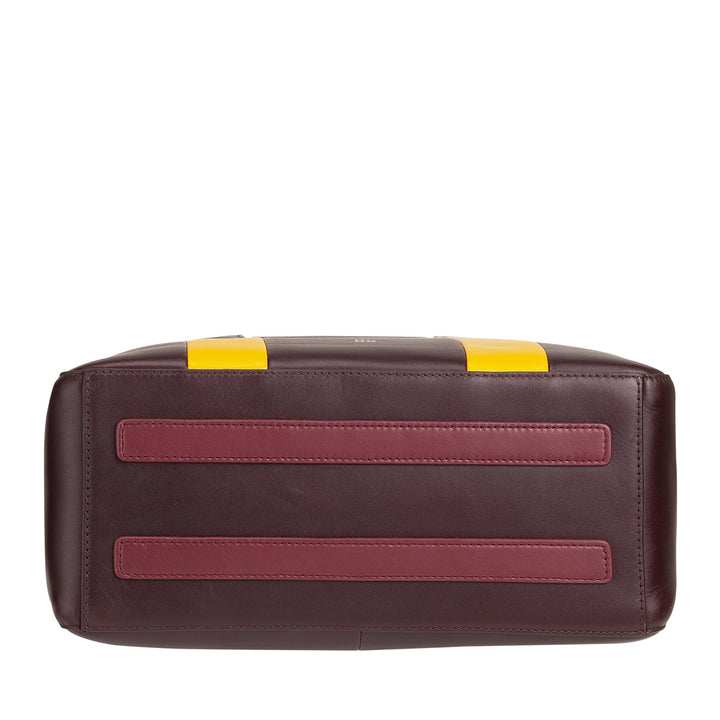 Bottom view of a luxury maroon leather handbag with yellow and red accents