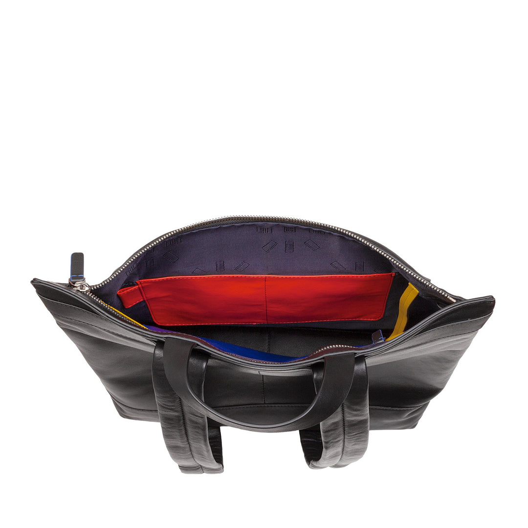 Open black leather handbag revealing red, yellow, and blue interior compartments
