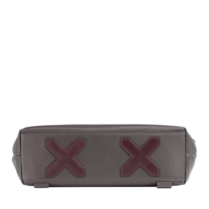Gray leather handbag with two maroon X-shaped patches on the bottom