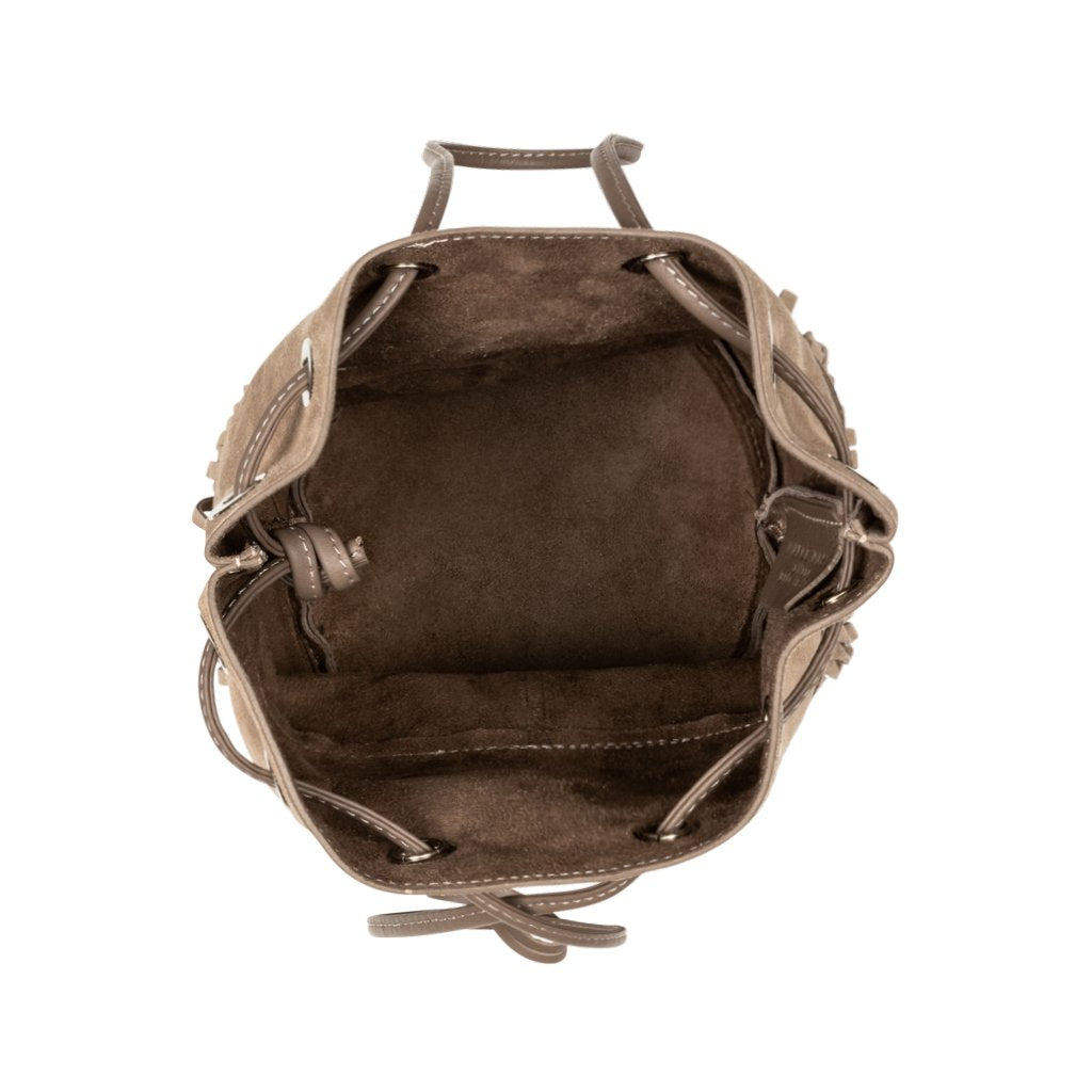 Top view of an empty brown leather bucket bag with suede lining and drawstring closure