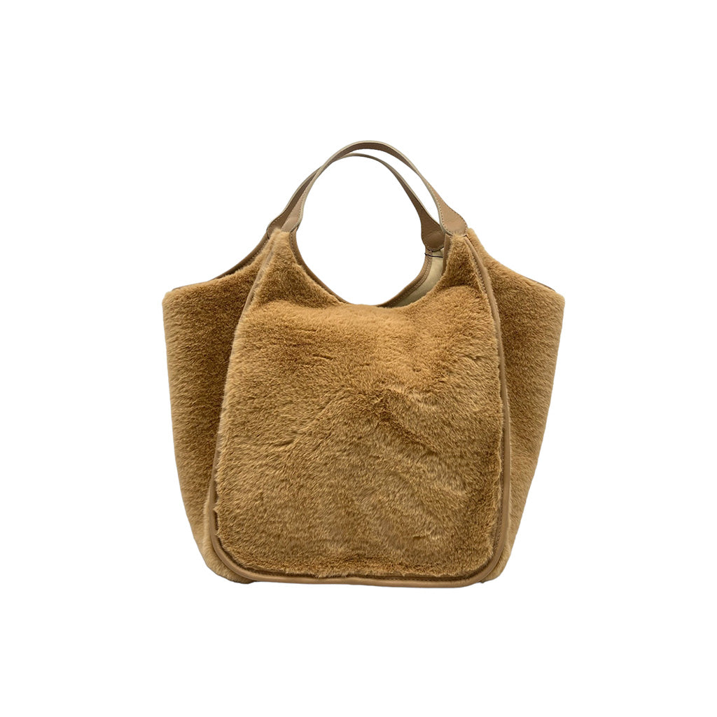 Tan faux fur handbag with leather handles