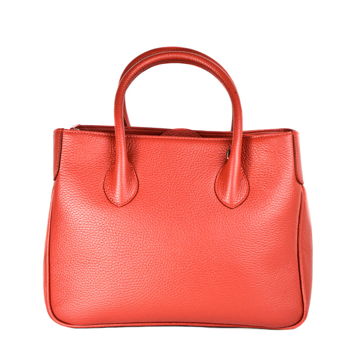 Red leather handbag with dual handles against white background