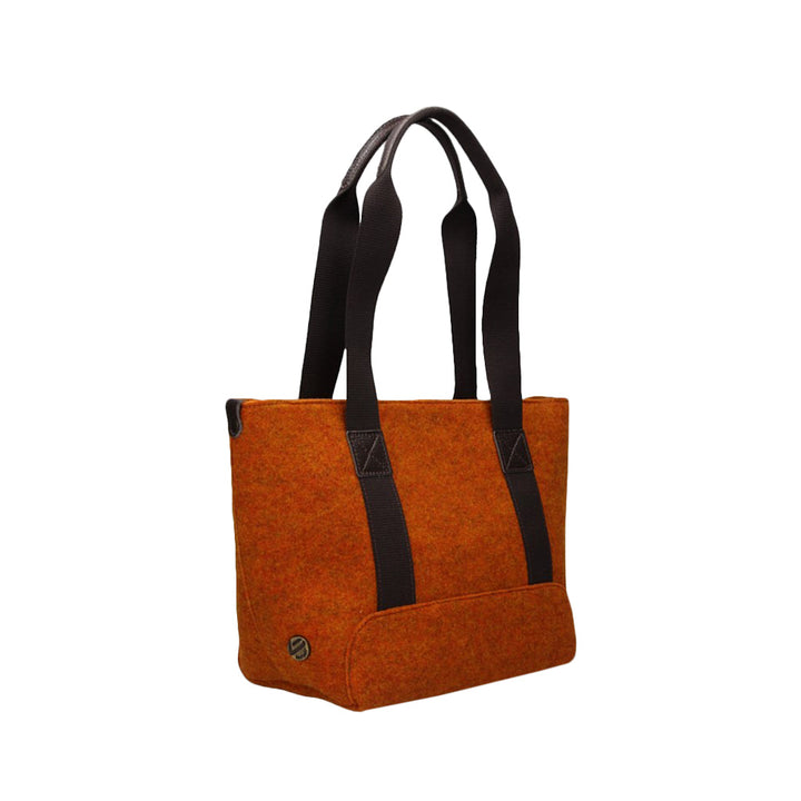 Rustic orange tote bag with black handles and stitching details