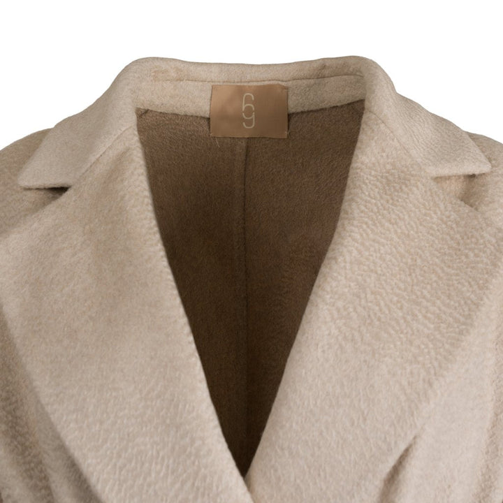 Beige wool coat with collar and branded tag inside