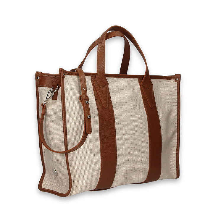Brown and beige canvas tote bag with leather straps