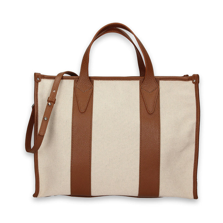 Tan leather and canvas tote bag with shoulder strap