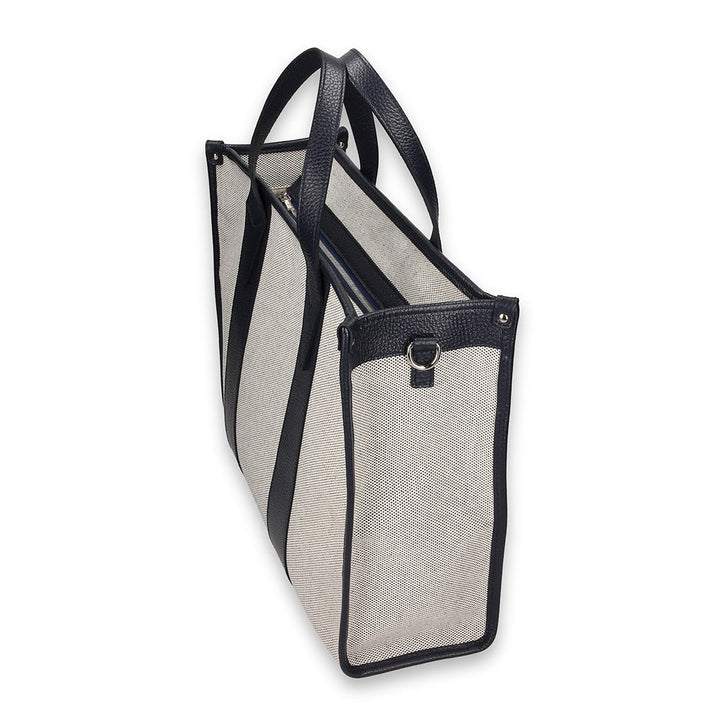 Black and white tote bag with open top and handles