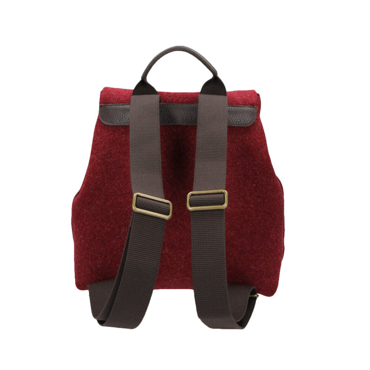 Red wool backpack with brown adjustable straps and black trim