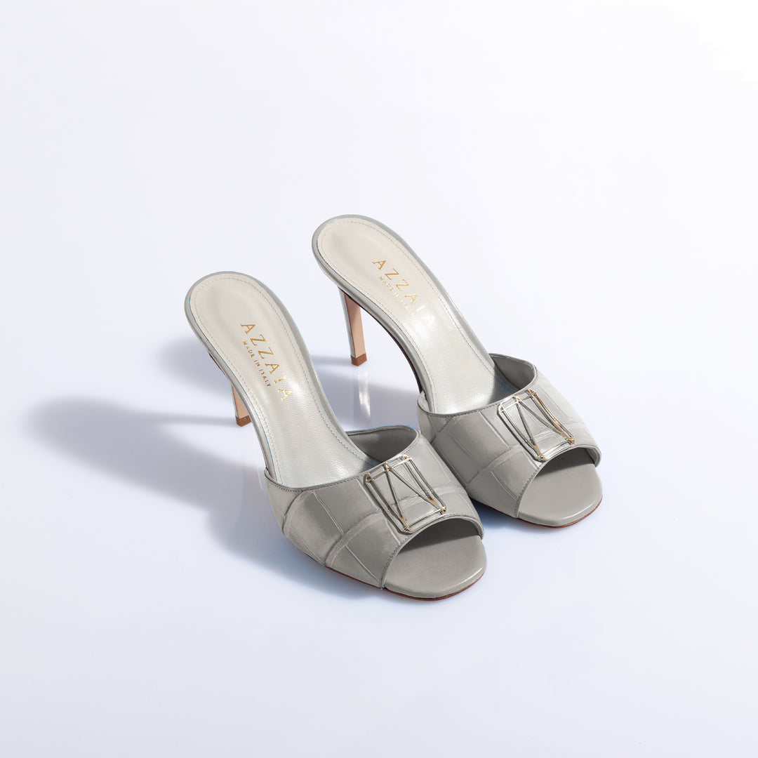 Silver high-heeled sandals with square buckle design