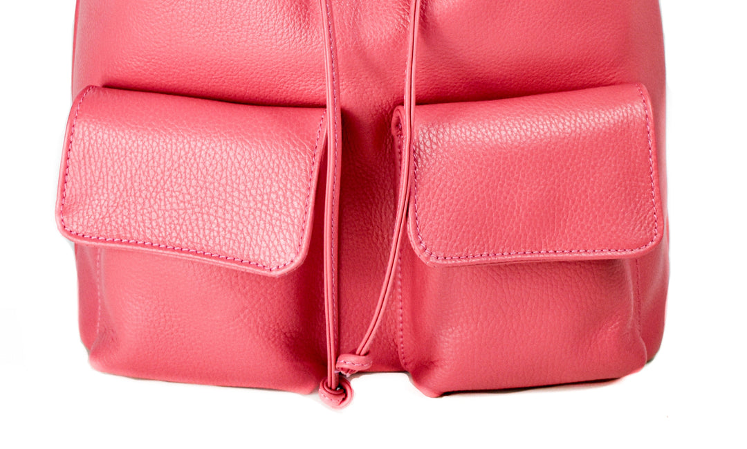 Pink leather backpack with front pockets