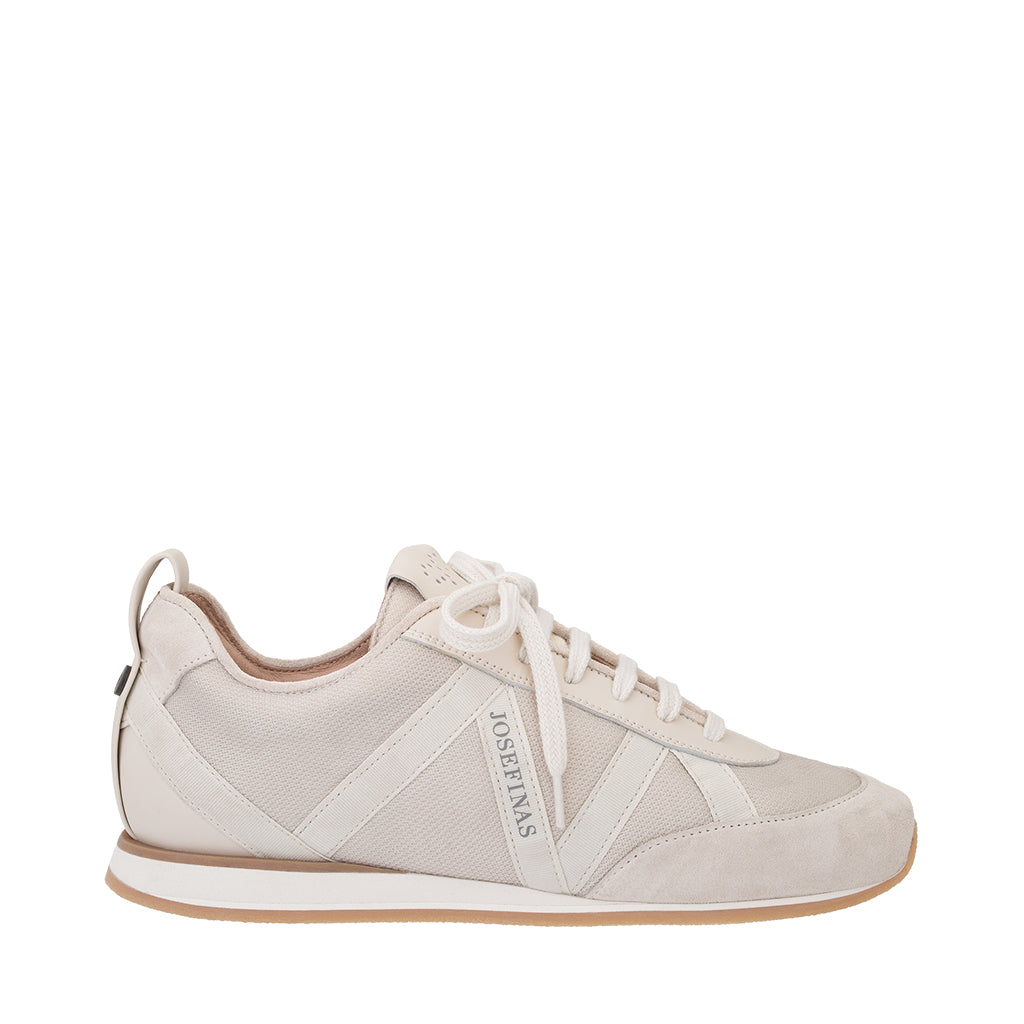 White casual sneaker with laces and a textured sole