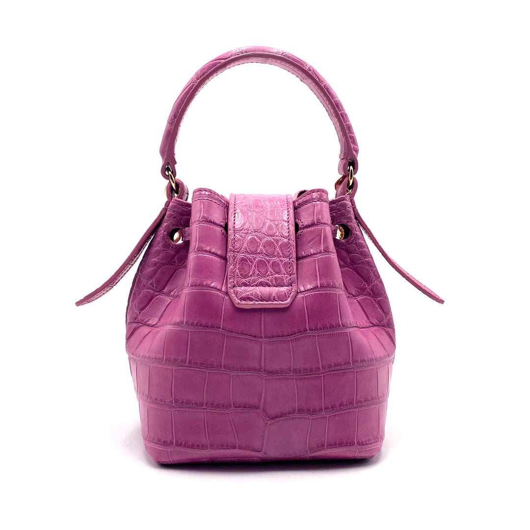 Pink crocodile leather handbag with bucket shape and single handle