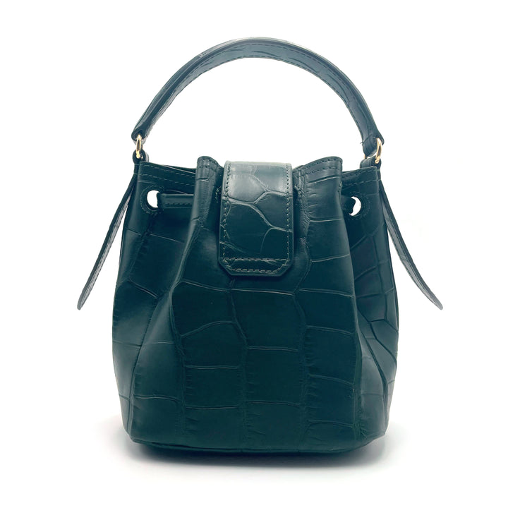 Dark green leather handbag with crocodile pattern and a top handle against a white background