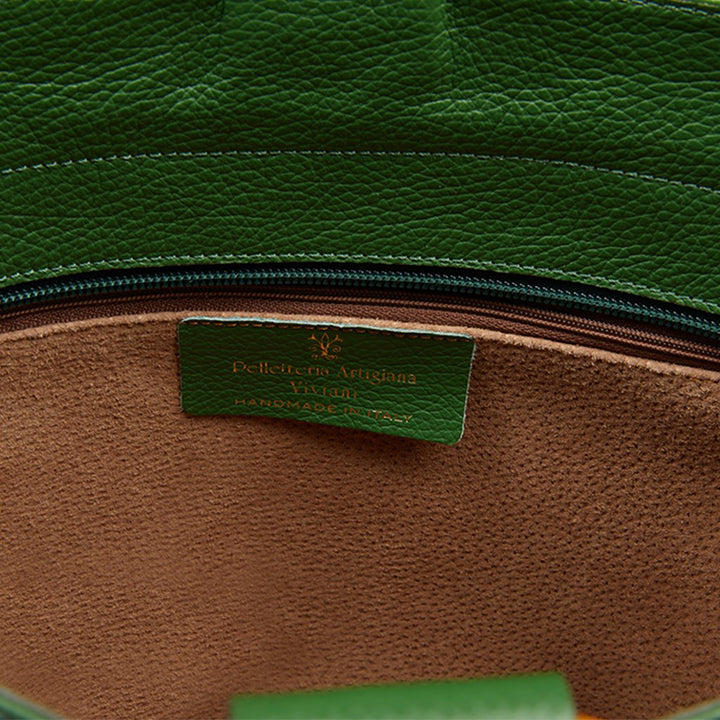Green leather handbag with brown suede interior and Pelleria Artigiana Italia label