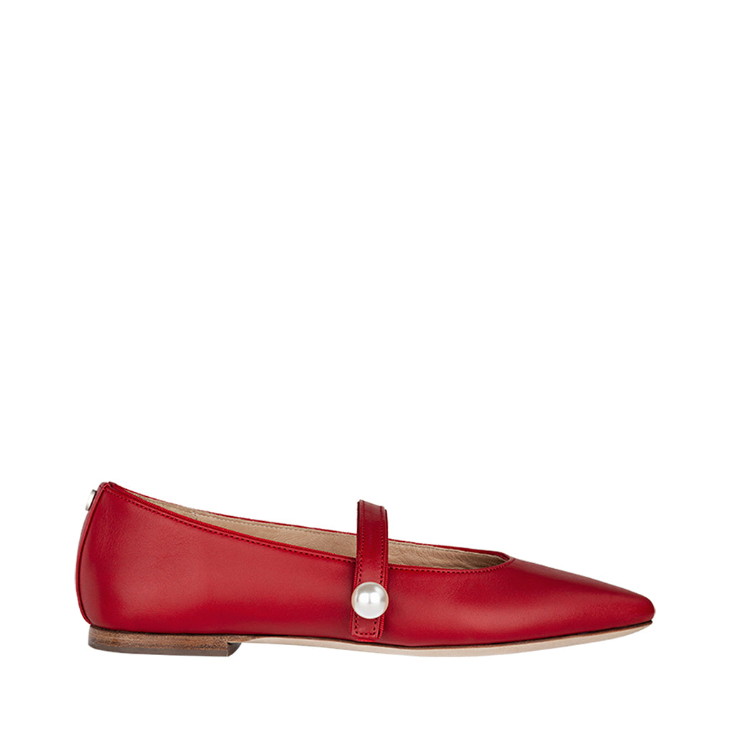 Red leather Mary Jane flat shoe with a pearl button detail