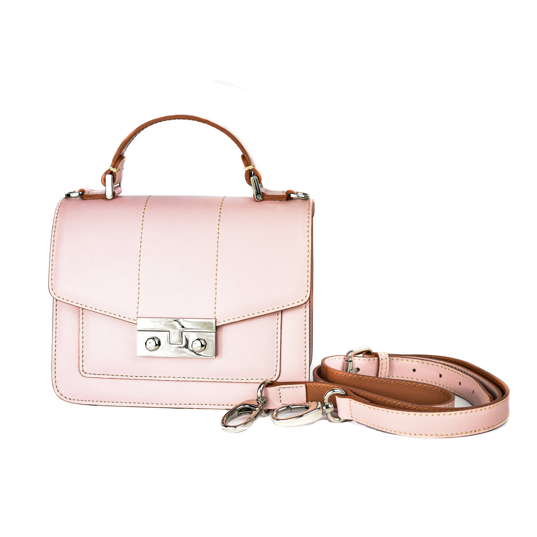 Elegant pink leather handbag with detachable strap and silver buckle