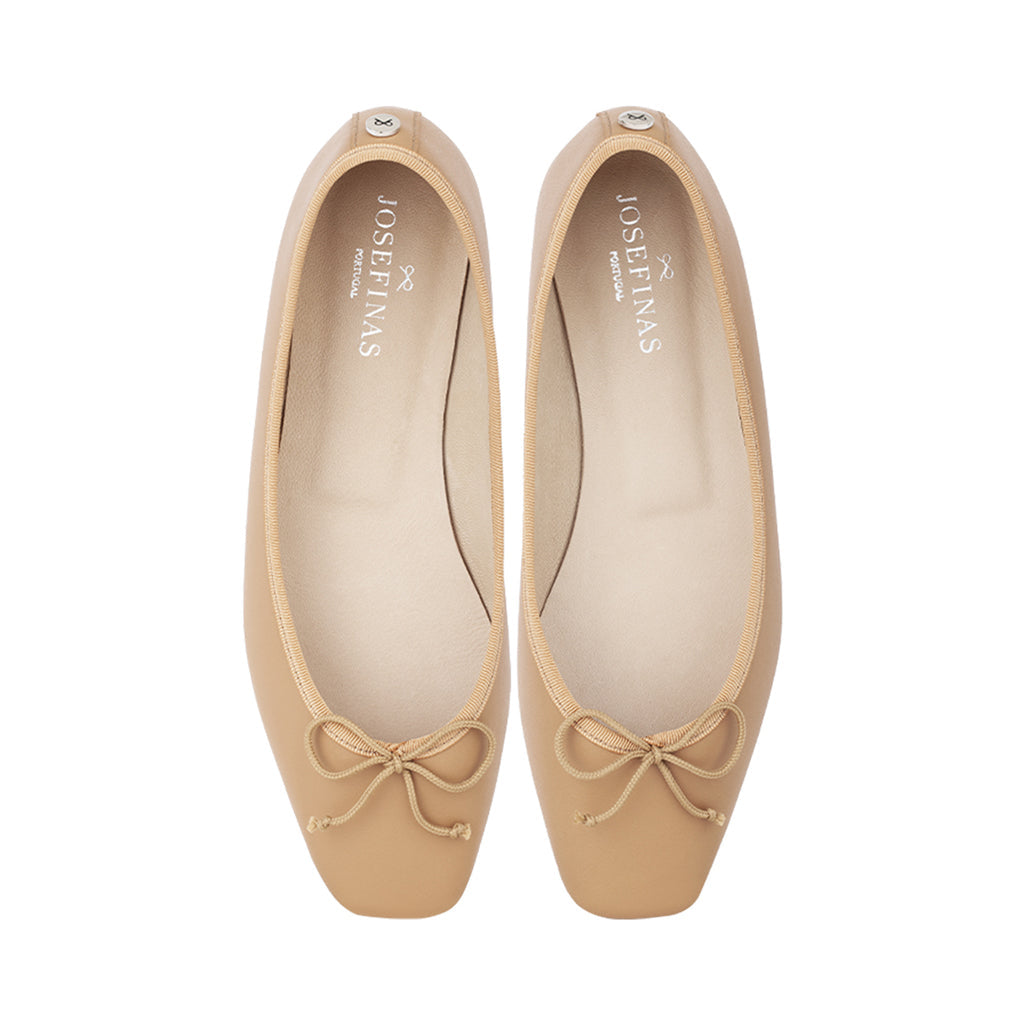 Beige square toe ballet flats with bows on toes