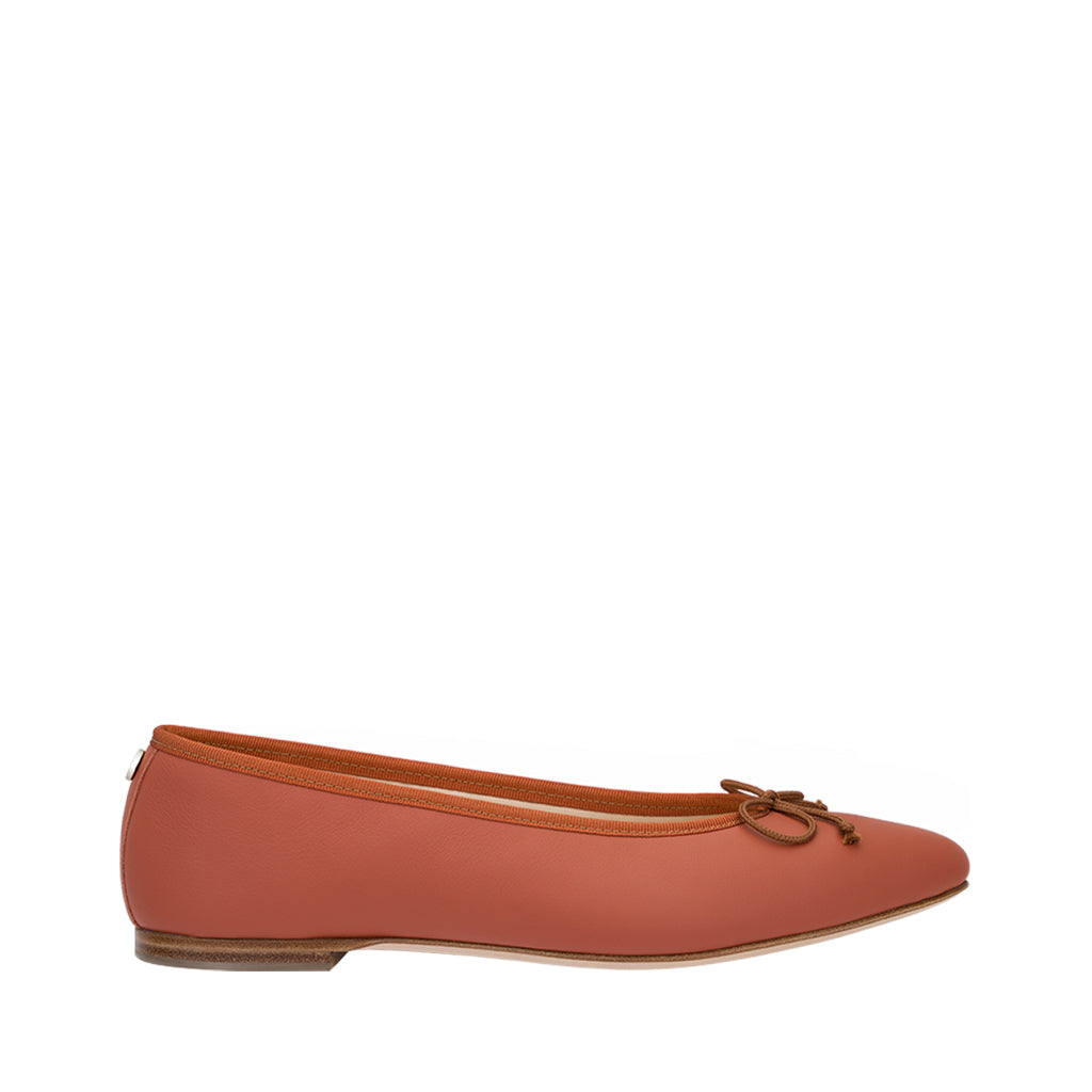 Women's red leather ballet flat with bow detail